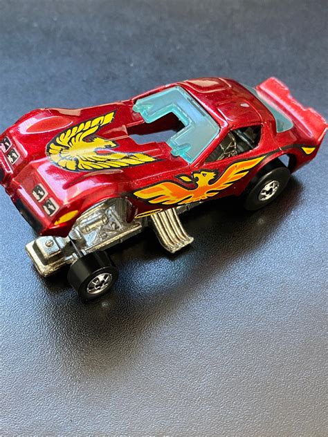 Trending pages '57 Chevy Rodger Dodger Super Van Red Baron Rescue Ranger The Demon. . 1977 hot wheels funny car